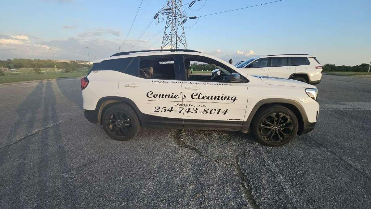 White Connie's Cleaning SUV parked in Temple, Texas